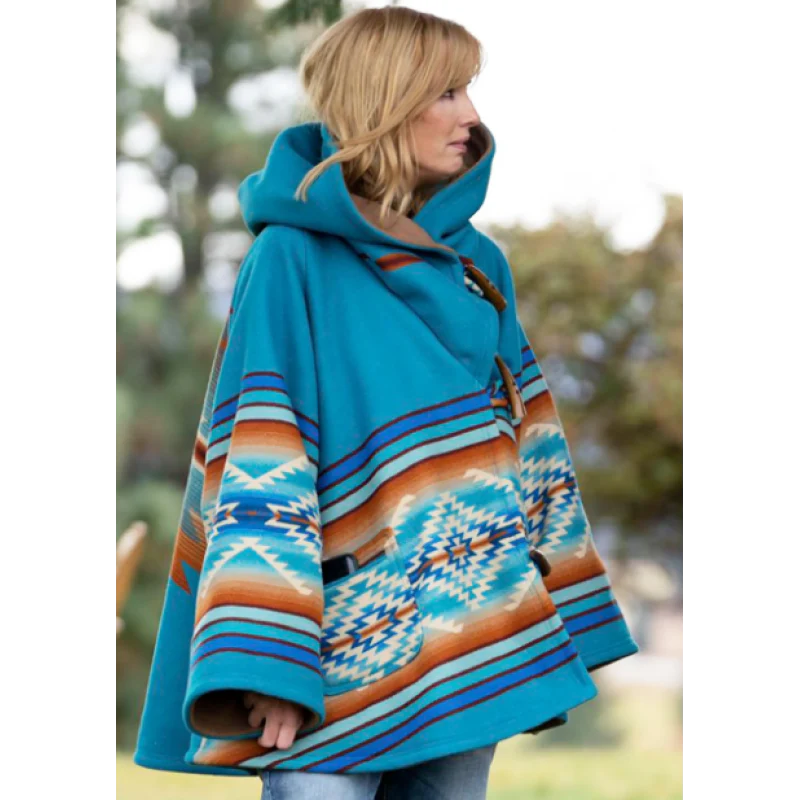 beth-dutton-yellowstone-kelly-reilly-blue-poncho-core